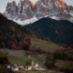 Mountain Peaks Behind Sleepy Mountain Town with Church